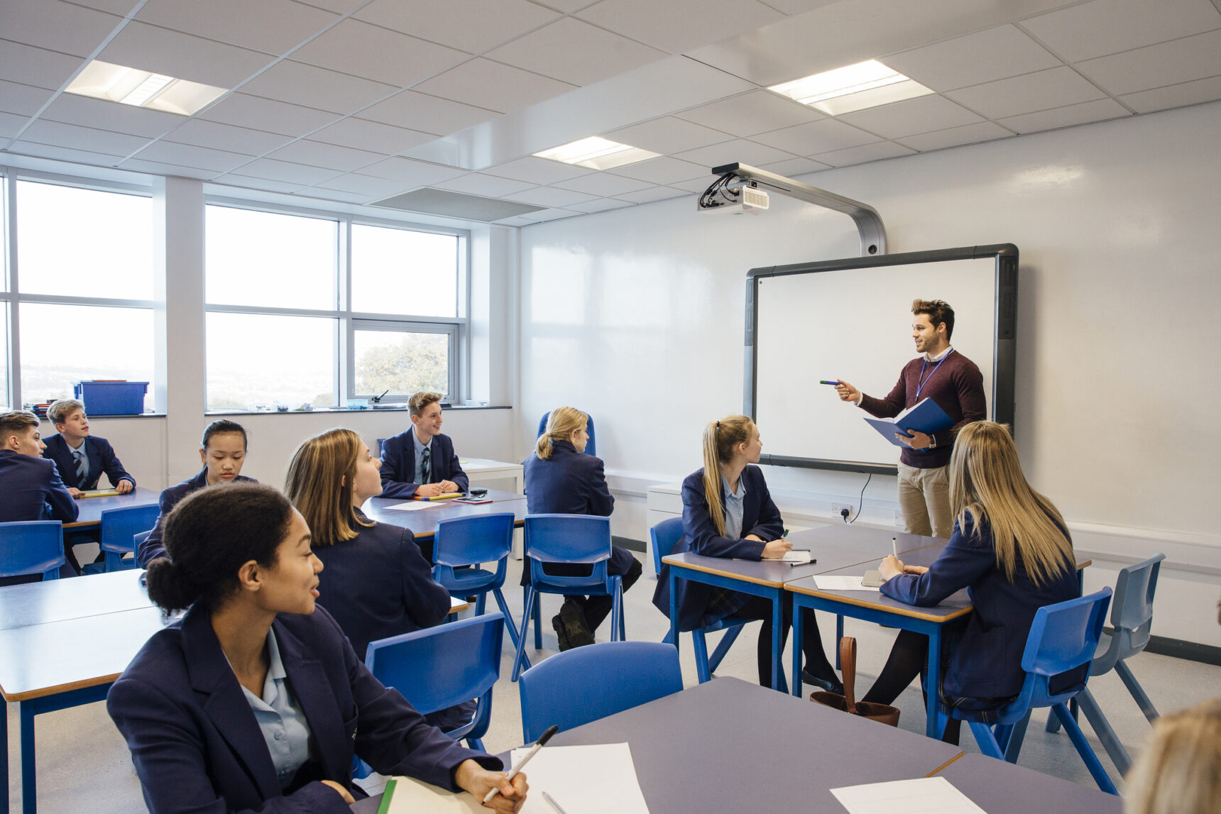 Teacher using mini whiteboards in his lesson.