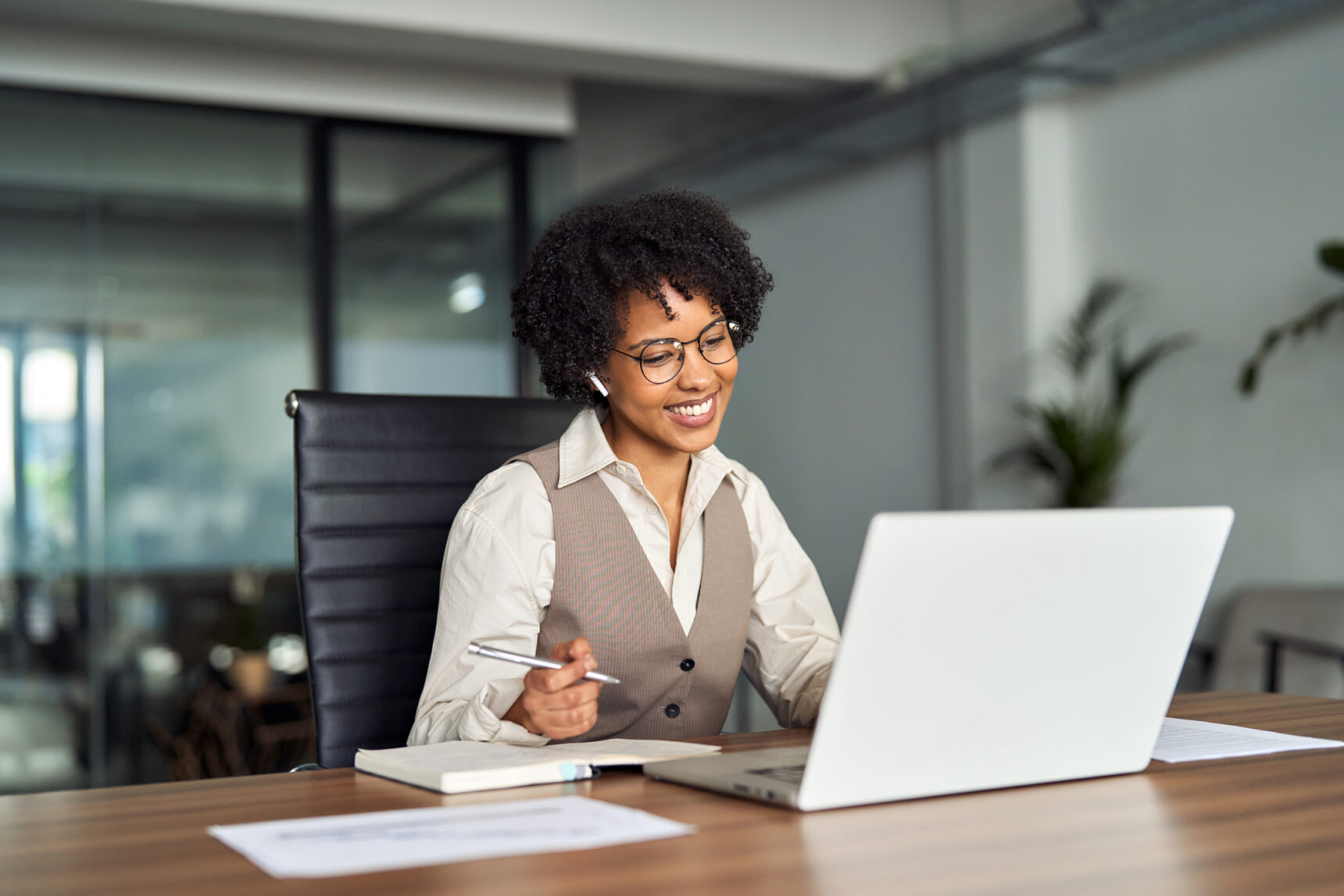 Smiling student on an online university interview.