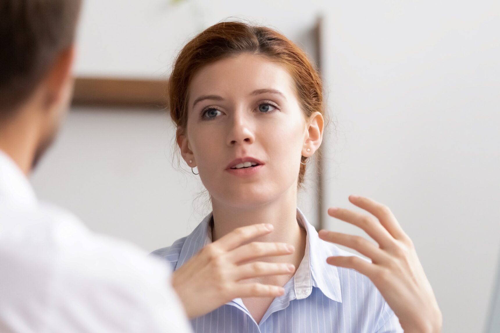 Confident female chatting in an interview for a career in STEM.