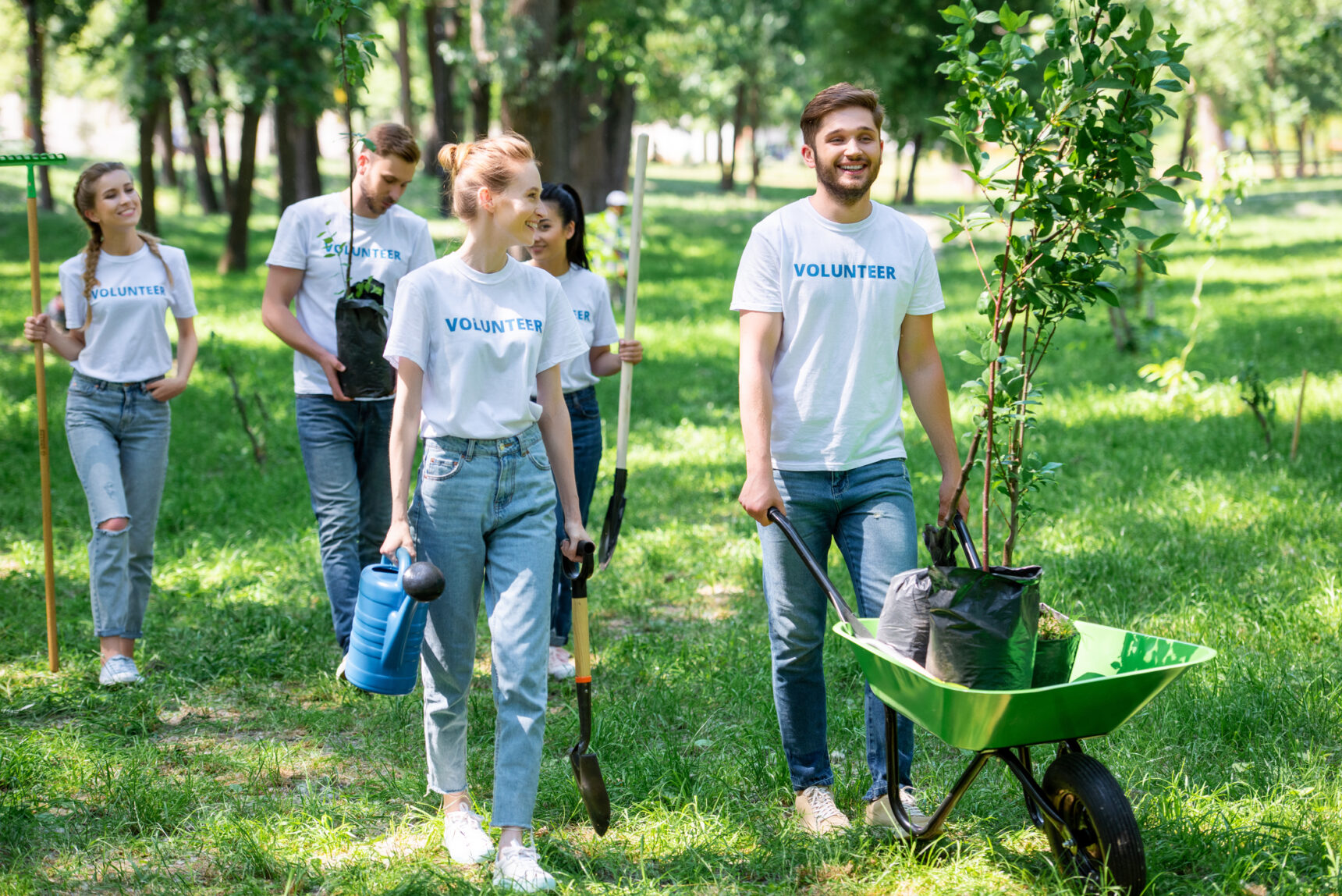 Group of volunteers undertaking gardening projects for sustainability goals