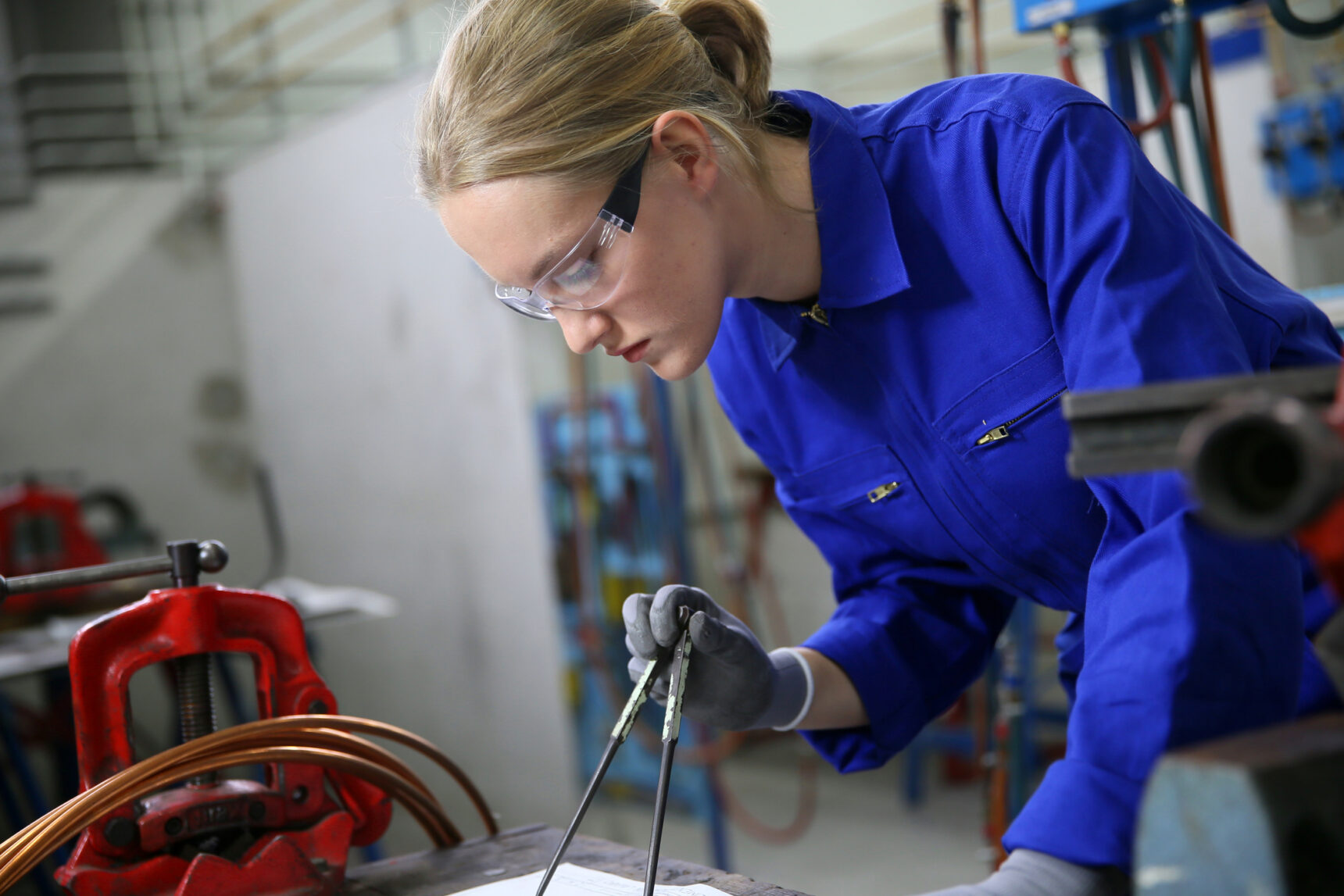 Female plumbing apprentice.