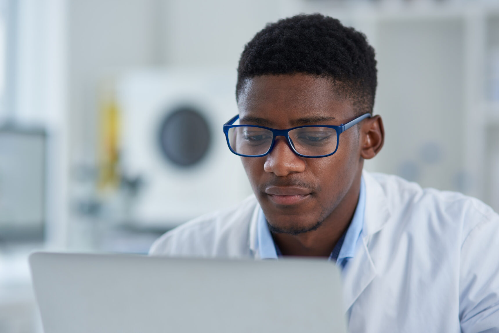 Natural sciences diploma student on computer.