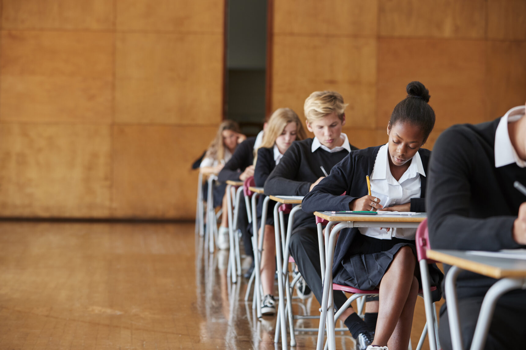 GCSE students sitting exam.